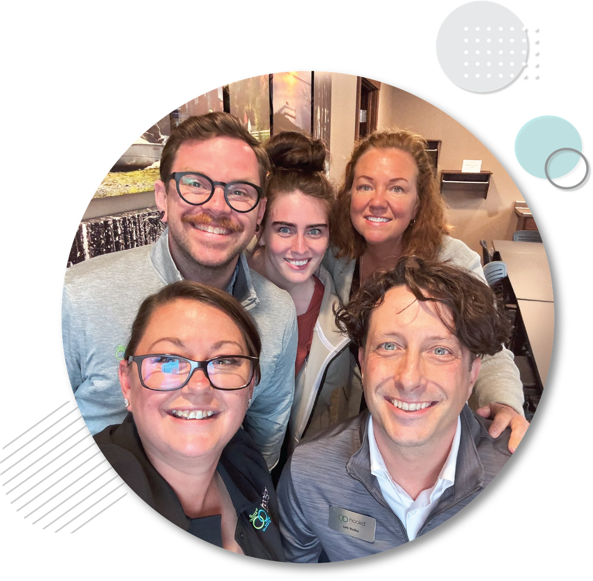 Hookd Promotions Team 2025 – Digital Marketing Experts in the Midwest Smiling Hookd Promotions marketing team group photo, experts in digital marketing and strategy